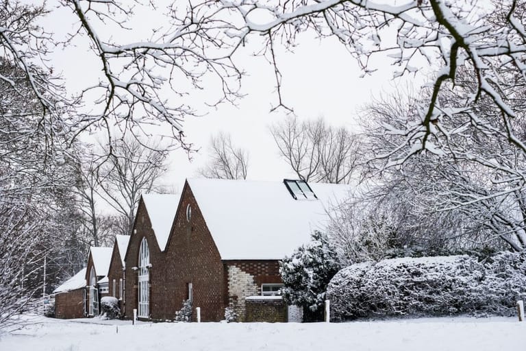 Snow-covered roofs showing winter weather conditions in Colorado