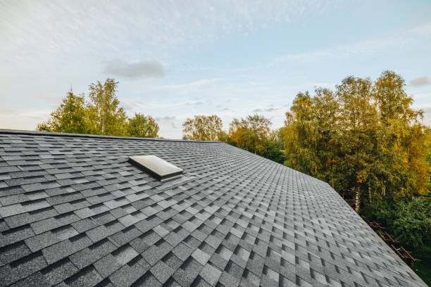 new renovated roof covered with asphalt shingle roof