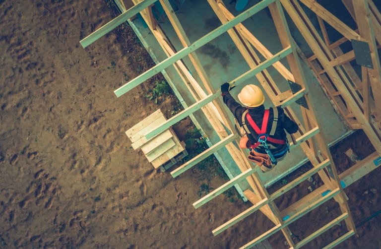 Roof structure with sheathing exposed during a residential re-roof